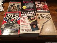 Front covers of all six paperbacks displayed
