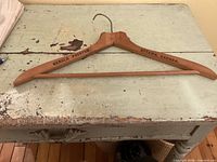 Gerald Preston Ottawa Canada wooden hanger showing branding, hook, bar