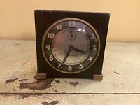 Front view of Westclox wind-up alarm clock showing dial, bezel and case