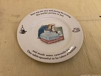 Front of plate showing Peter Rabbit illustration and text