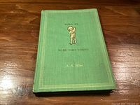 Front cover of green cloth hardcover book When We Were Very Young