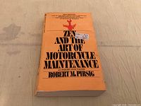 Front cover of paperback book showing title, author and price sticker