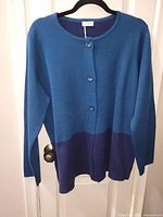 Front view showing two-tone design, buttons, size and overall condition