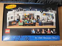 Front of sealed LEGO Ideas Seinfeld set 21328 box showing artwork and piece count