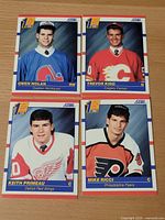 Front view of all four Score rookie cards