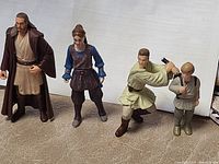 Front view of all four Episode I figures standing side by side
