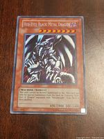 Front of Red-Eyes Black Metal Dragon card showing artwork, stats, set code