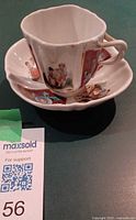 Cup on saucer showing overall set and lobed shapes