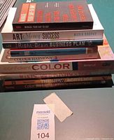 Stack of nine art and art-business related books
