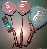 Rackets in covers and ball canister overview