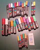 Group of 33 Uni Posca markers assorted colours and sizes