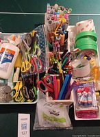 Overview showing markers, pens, tapes, scissors, glue, Surebonder glue sticks