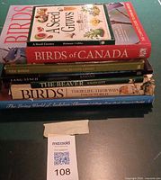 Stack of six nature and bird books