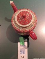 Top view showing lid design, handle and spout