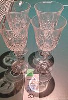 Four crystal goblets side view