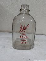 Front view showing red printed logo and slogan