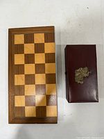 Top view of chessboard and storage box showing overall condition