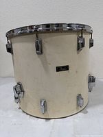 Full view of drum showing cream shell, chrome hardware, Evans head