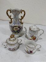 Group shot of all four porcelain pieces