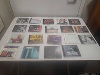 All 15 CDs laid out on table