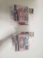 Both sealed Yu-Gi-Oh! figures front view