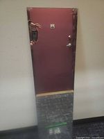 full view of frameless wall mirror standing vertically