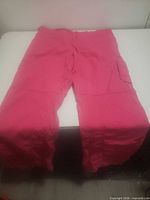 Full view of pink scrub pants front