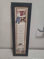 Full view of framed Laundry Rules wall art