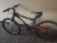 Full right-side view of bicycle showing frame color, wheel size, drivetrain