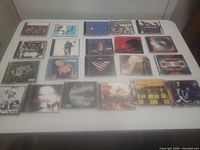 All 20 CDs laid out on table