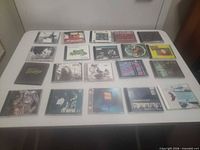 Overview of all 20 CDs laid out on table