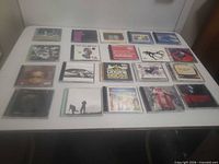 Overview of all 20 CDs laid out on table