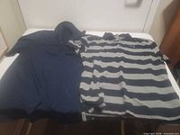 Top view of both polo shirts laid flat