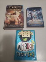 All three books front covers visible