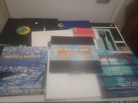 All records laid out showing fronts of sleeves and labels