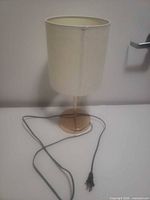 Full view of lamp with cord and plug visible