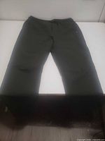 Front view of entire jogger pants laid flat