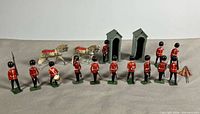 Full set: 13 soldiers, 2 horses, 2 sentry boxes
