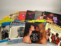 Front view showing 12 LP covers fanned out