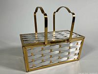 Side view showing woven metal panels and handles