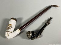 Two pipes side by side showing relative size and design