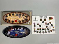 All three 13-coin sets with one outer sleeve visible