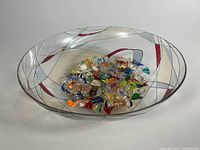 Wide view of fused glass bowl filled with Murano candies