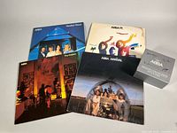 Four ABBA vinyl LP jackets and CD box set overview