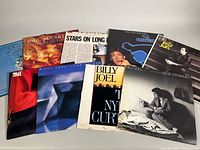 Nine record jackets group shot