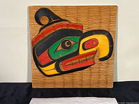 Full view of carved Thunderbird wood panel