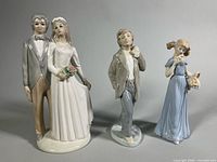 Front view of all three porcelain figurines