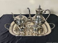 Full set on tray showing all five pieces