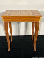 Full view of standing jewelry table front and legs