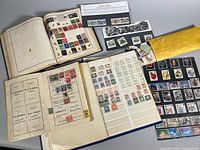 Overview of album, stock pages, display cards, envelope of stamps